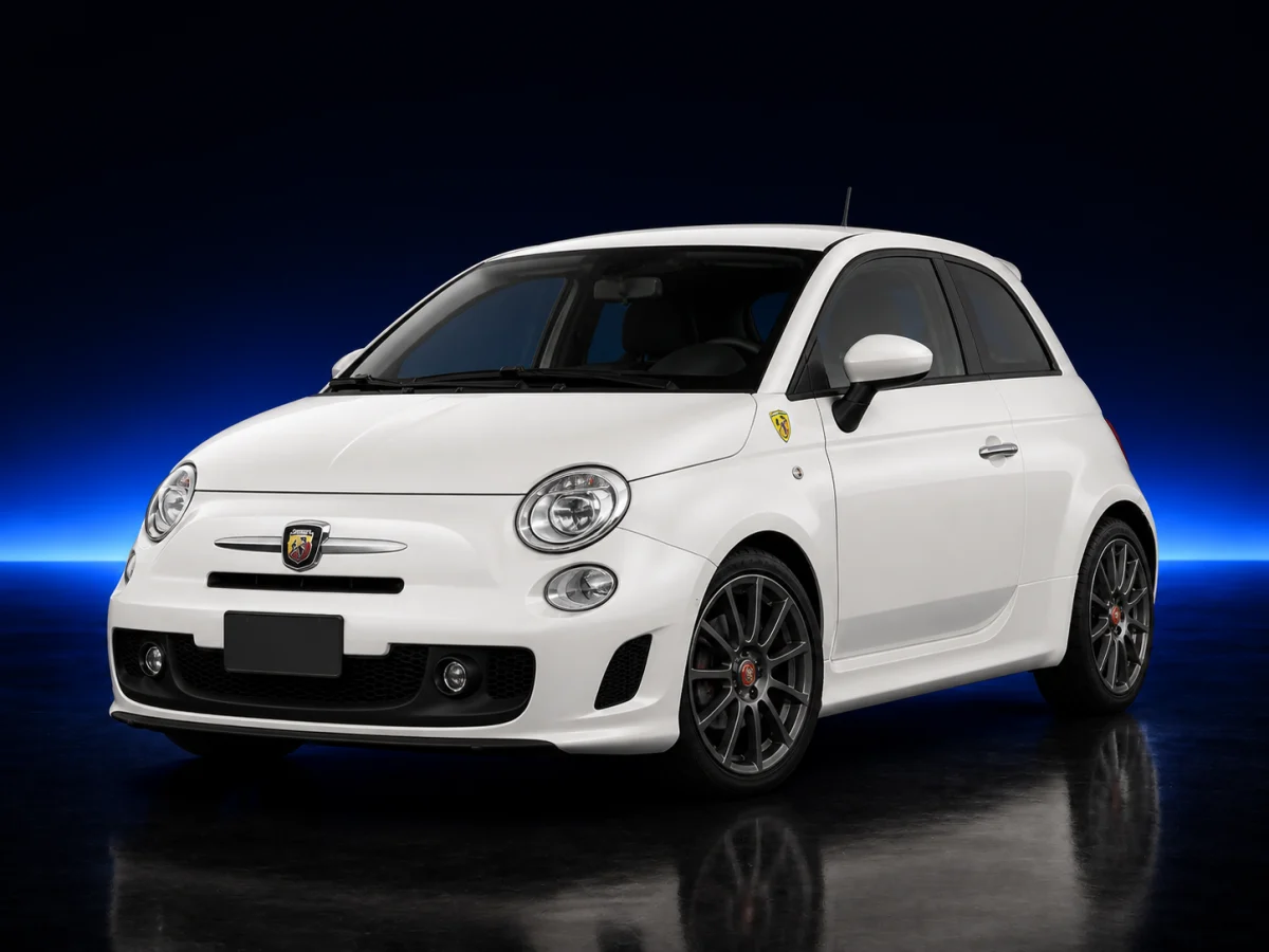 White Abarth 500 first generation on a deep navy and cobalt studio background.