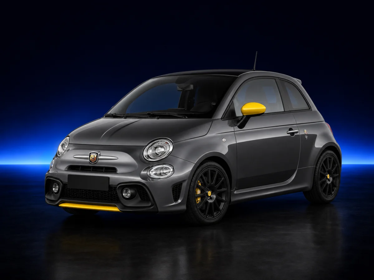 Grey Abarth 595 Trofeo on a deep navy and cobalt studio background.