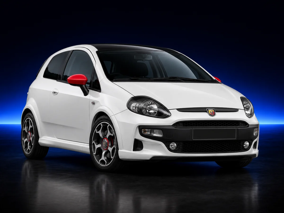 White Abarth Punto Evo on a deep navy and cobalt studio background.
