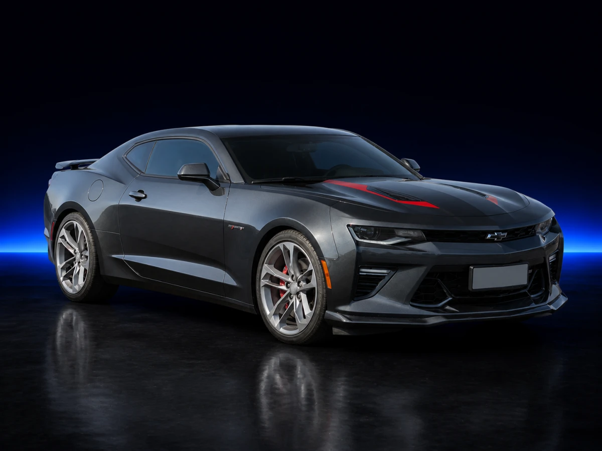 Grey Chevrolet Camaro VI 2SS 50th Anniversary coupé on a deep navy and cobalt studio background.