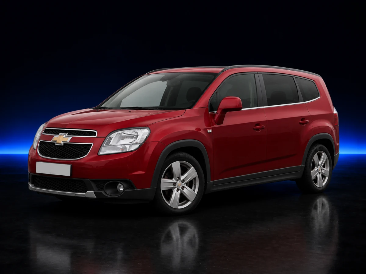 Dark red Chevrolet Orlando I J309 LTZ MPV on a deep navy and cobalt studio background.