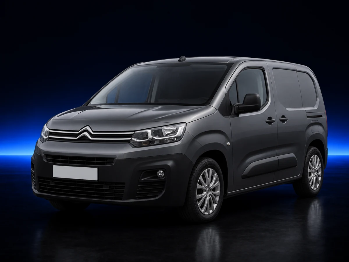 Dark grey Citroen Berlingo III panel van on a deep navy and cobalt studio background.