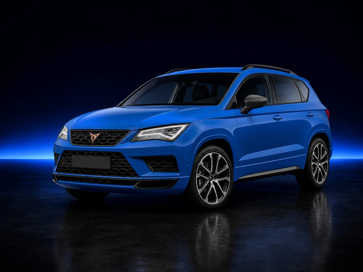 Blue Cupra Ateca pre-facelift on a deep navy and cobalt studio background.