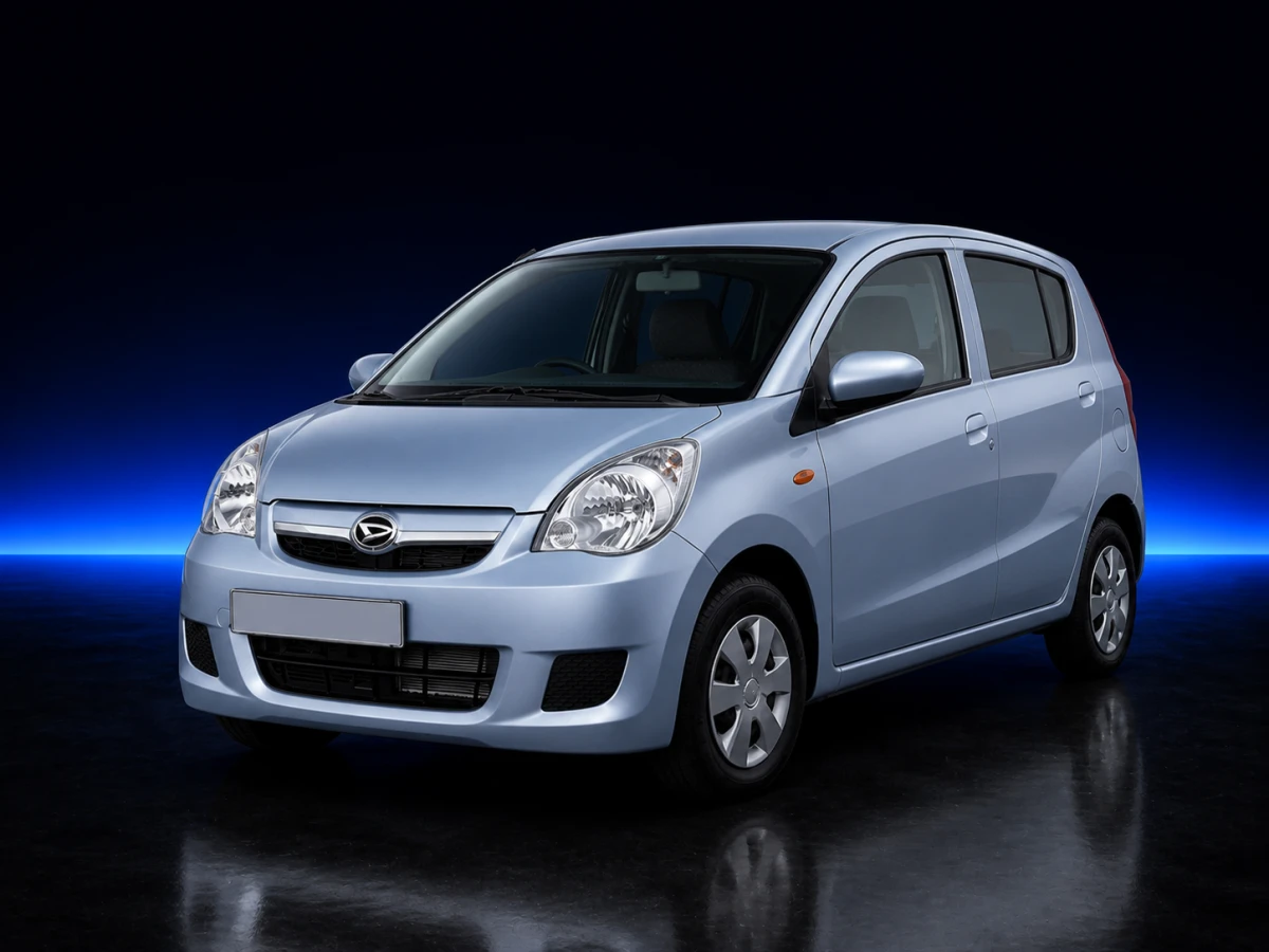 Light blue Daihatsu Cuore L275 five-door hatchback on a deep navy and cobalt studio background.