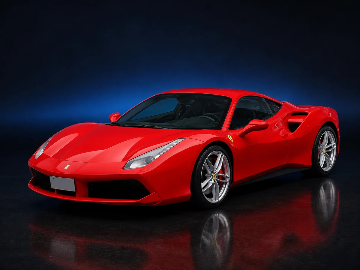 Red Ferrari 488 GTB coupé on a deep navy and cobalt studio background.