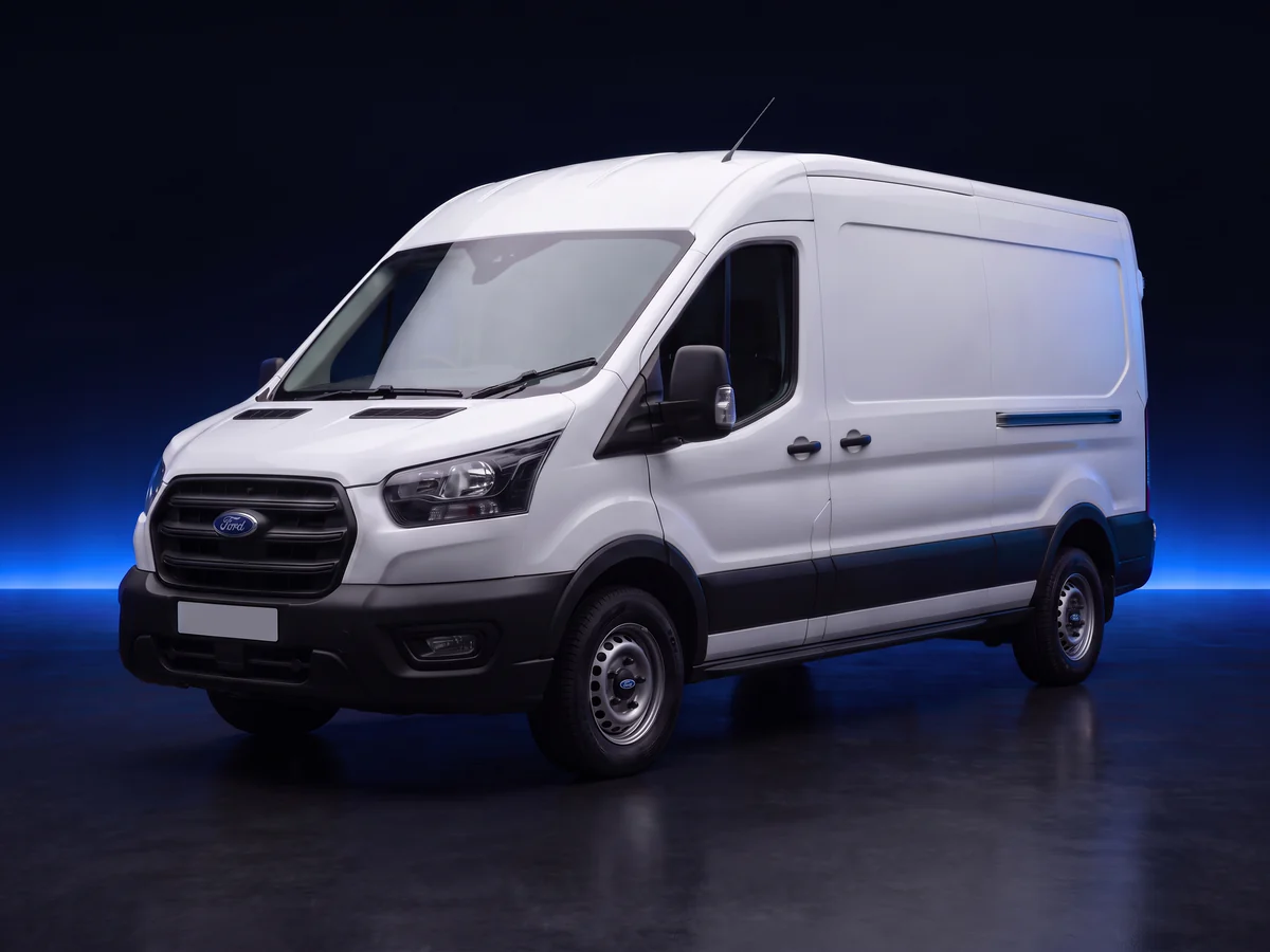 White Ford Transit Mk8 350 panel van on a deep navy and cobalt studio background.