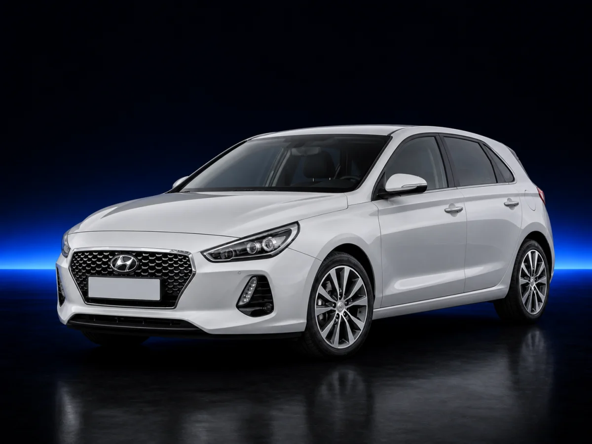 Silver Hyundai i30 III facelift on a deep navy and cobalt studio background.