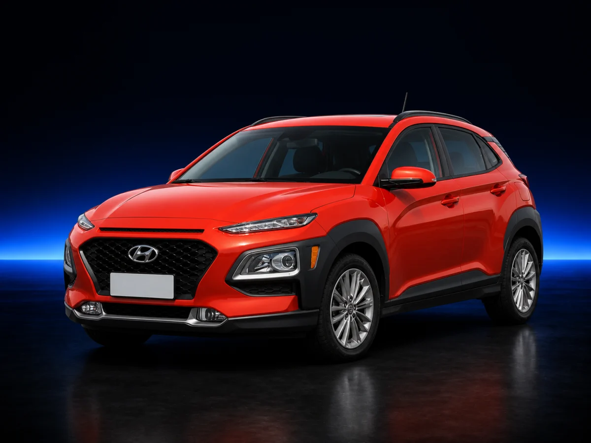 Orange Hyundai Kona on a deep navy and cobalt studio background.