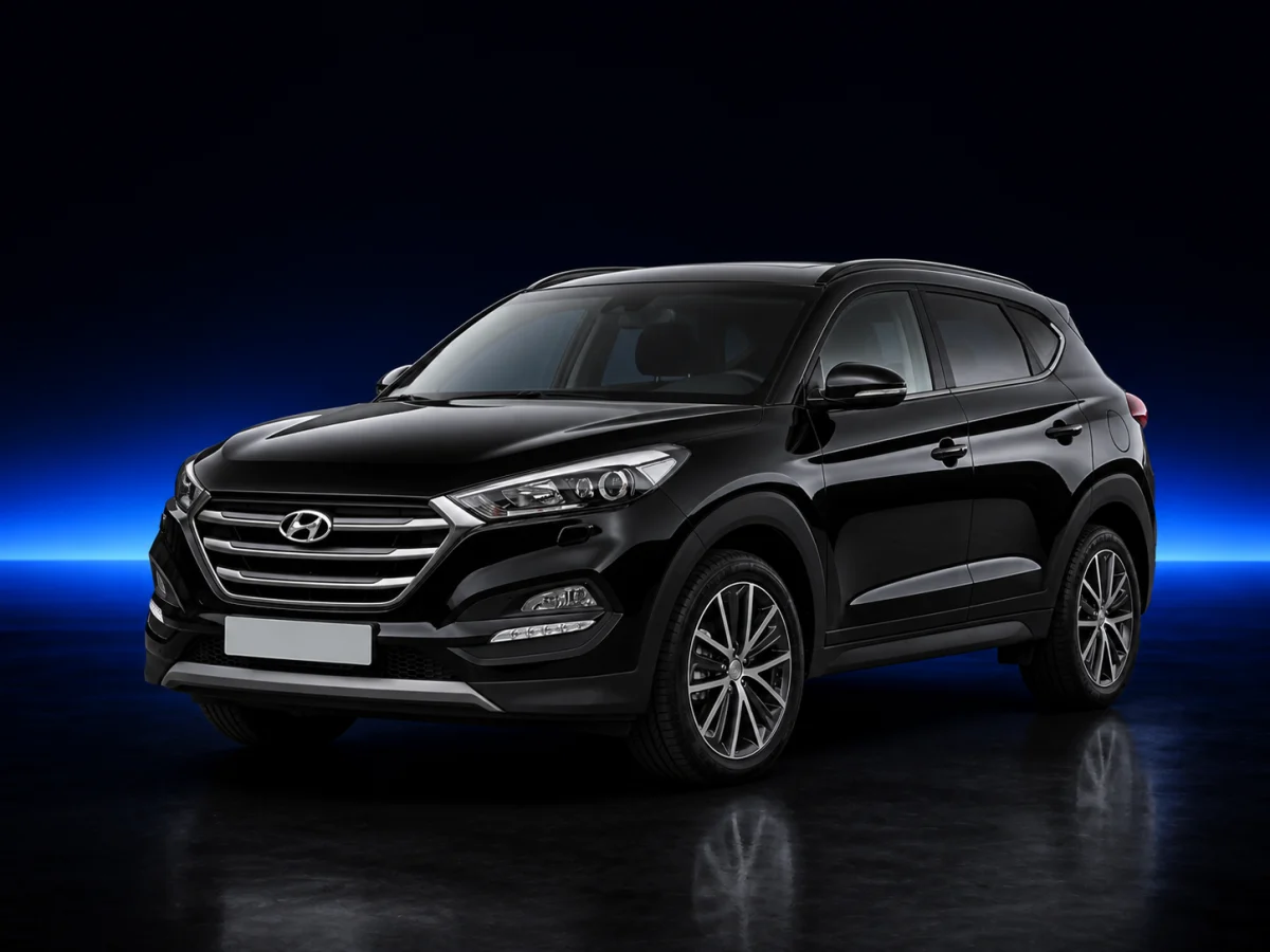 Black Hyundai Tucson III facelift on a deep navy and cobalt studio background.