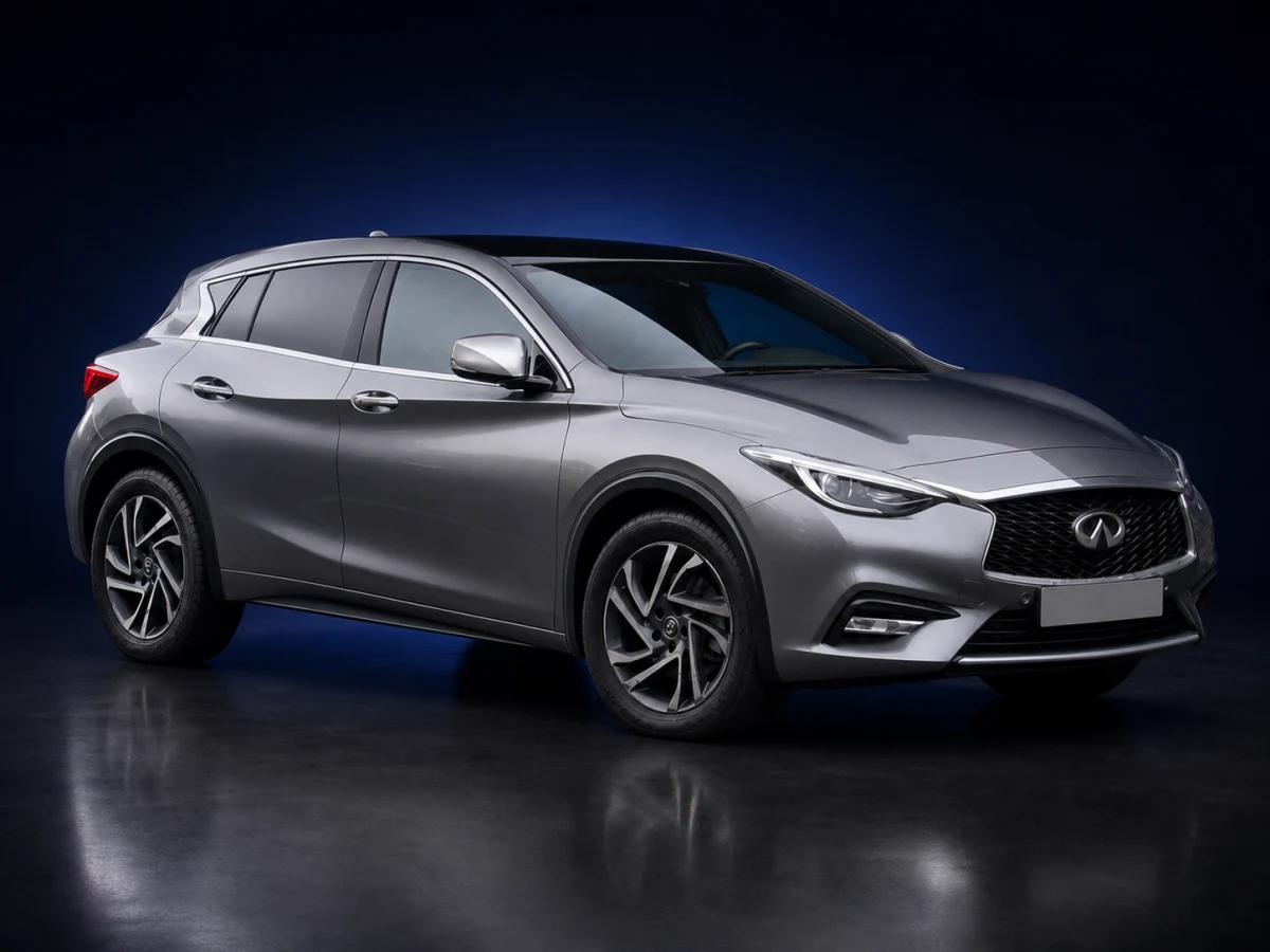 Silver-grey Infiniti Q30 H15 hatchback on a deep navy and cobalt studio background.
