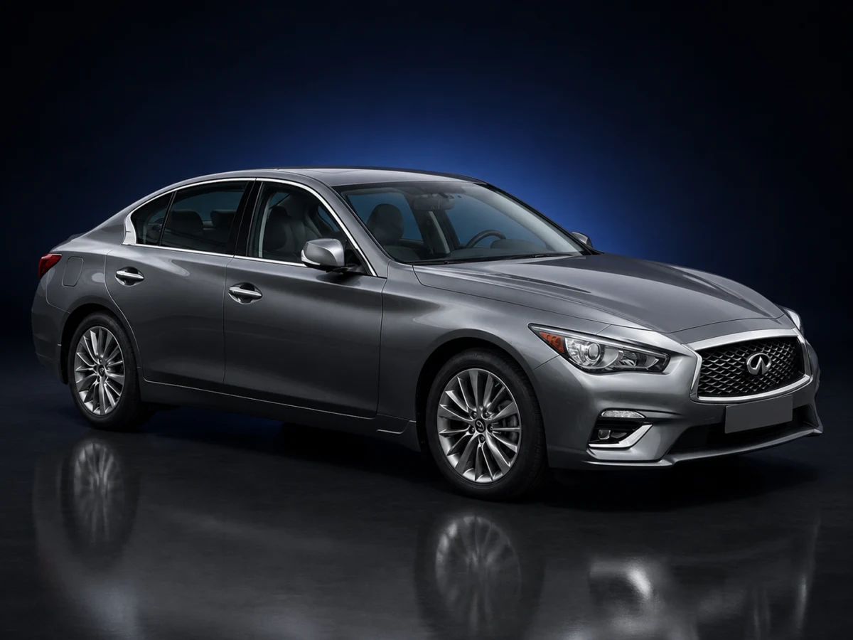 Dark grey Infiniti Q50 V37 saloon on a deep navy and cobalt studio background.