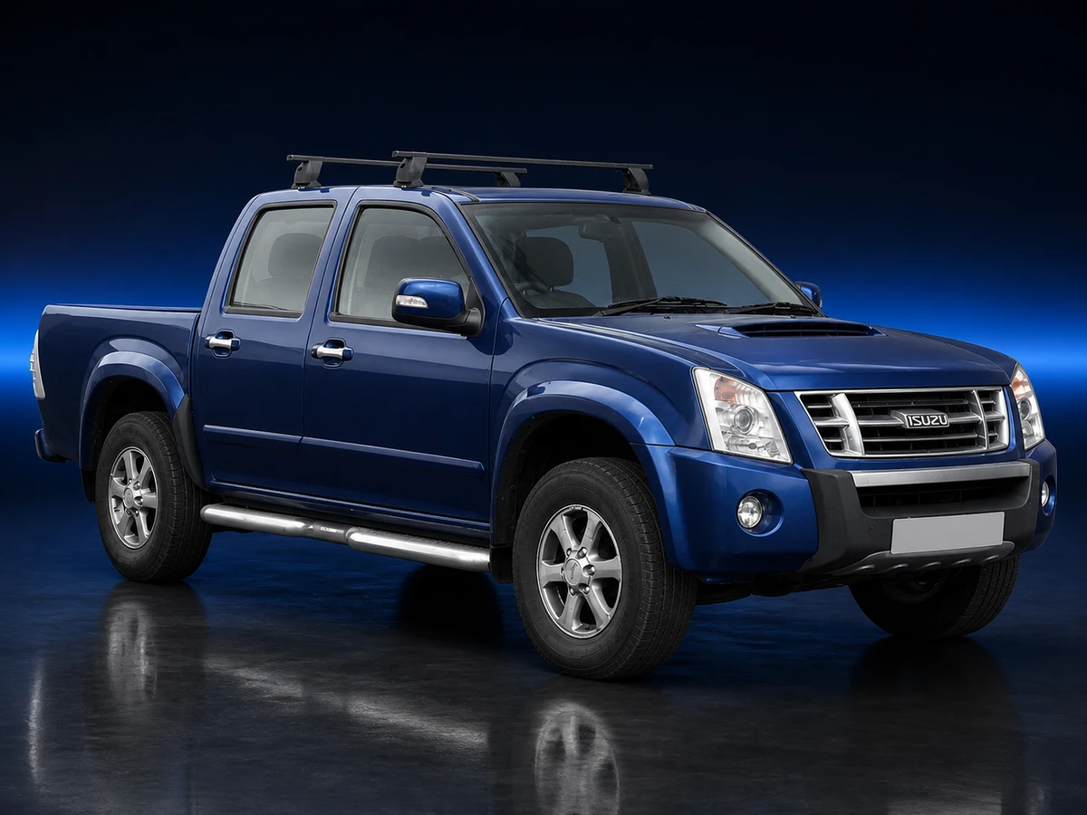 Blue Isuzu Rodeo Denver MAX UK pickup on a deep navy and cobalt studio background.