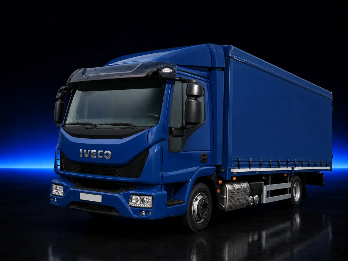 Blue Iveco Eurocargo IV MY2015 curtainside rigid truck on a deep navy and cobalt studio background.