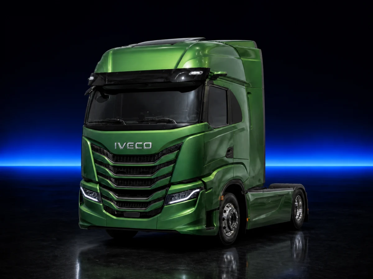 Green Iveco S-Way I 500 tractor unit on a deep navy and cobalt studio background.