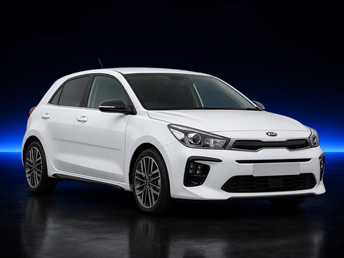 White Kia Rio YB GT-Line hatchback on a deep navy and cobalt studio background.