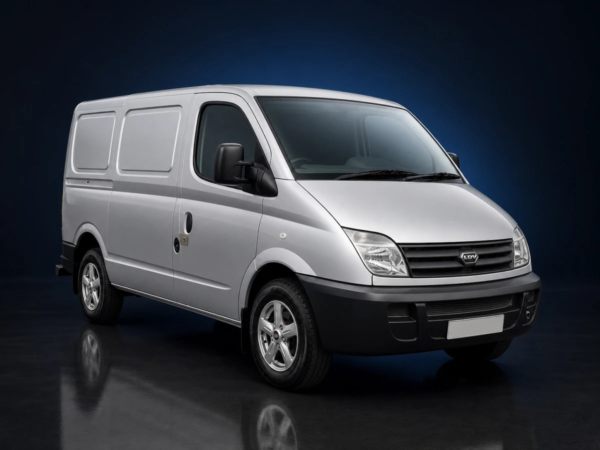 Silver first-generation LDV Maxus SWB 120 Platinum panel van on a deep navy and cobalt studio background.