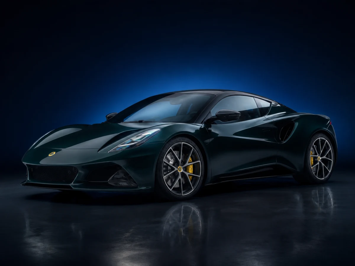 Dark green Lotus Emira Type 131 coupé on a deep navy and cobalt studio background.