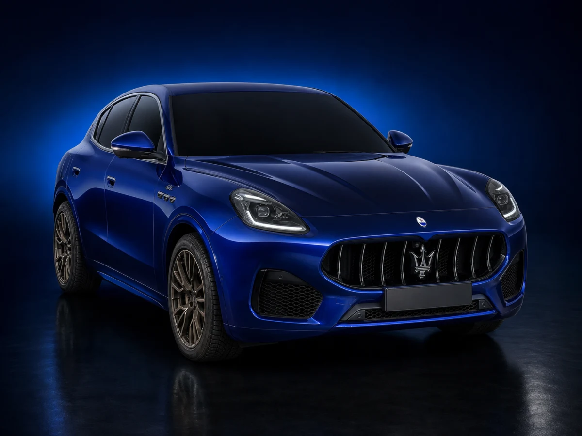 Deep blue Maserati Grecale M182 GT SUV on a deep navy and cobalt studio background.