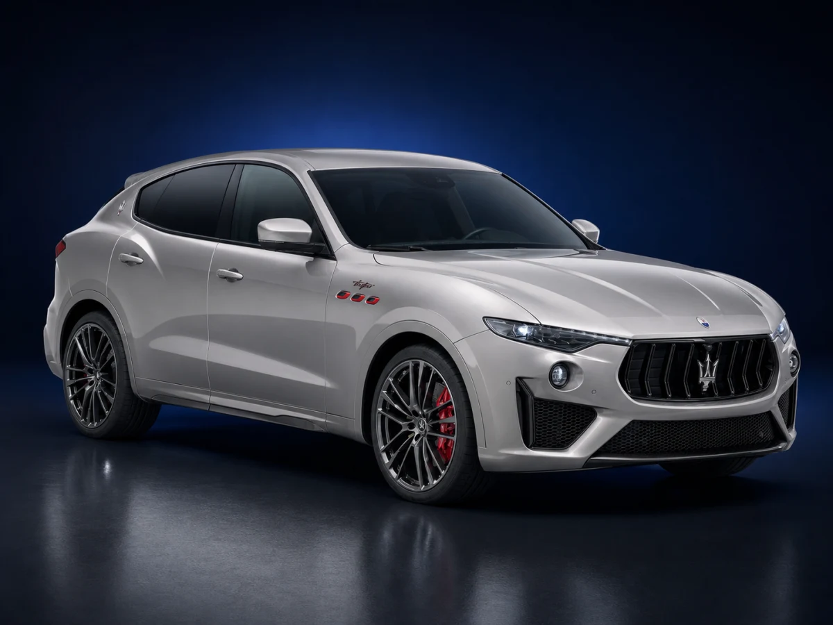 Silver-grey Maserati Levante M161 Trofeo SUV on a deep navy and cobalt studio background.