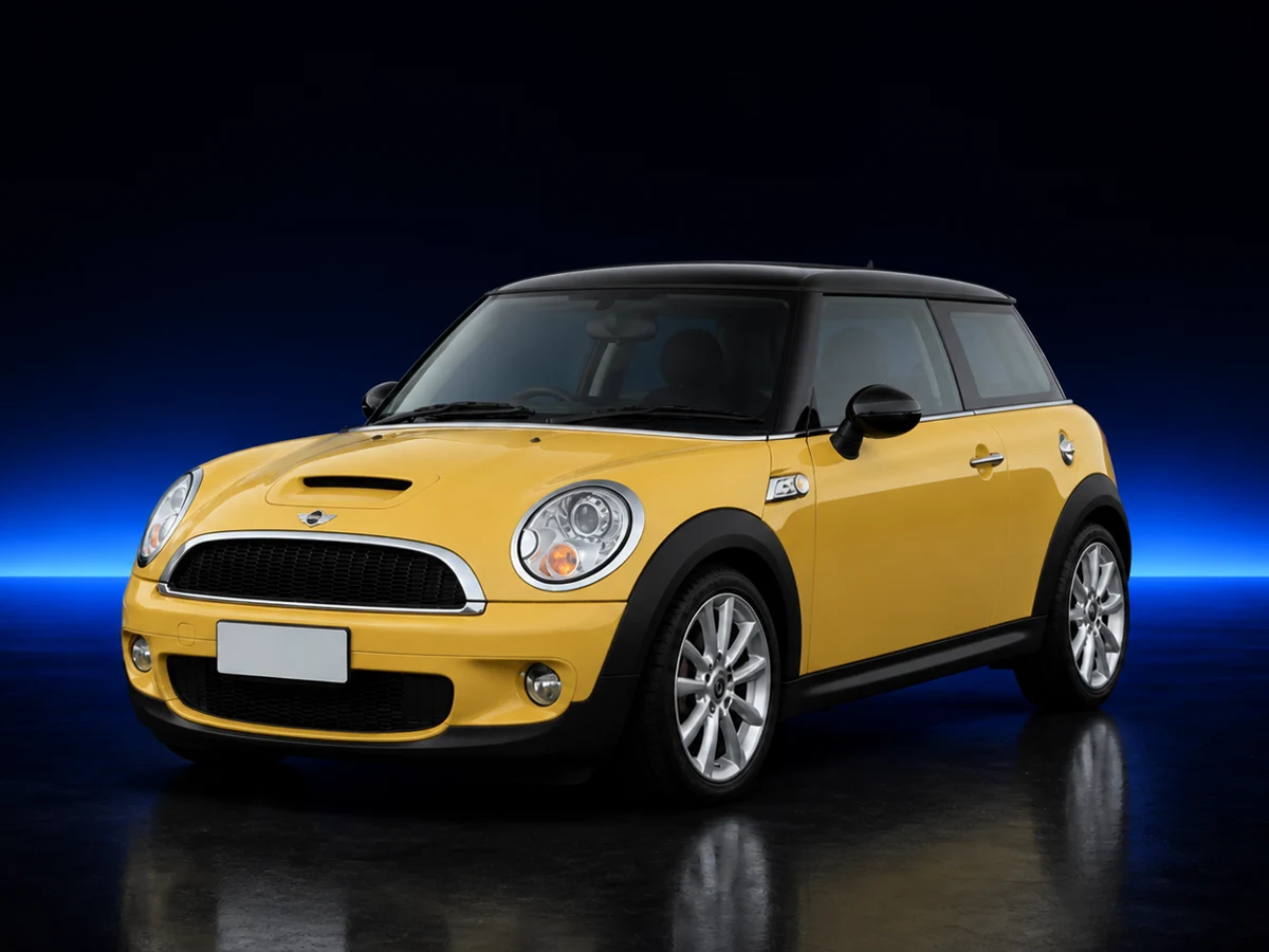 Yellow Mini Cooper S R56 on a deep navy and cobalt studio background.