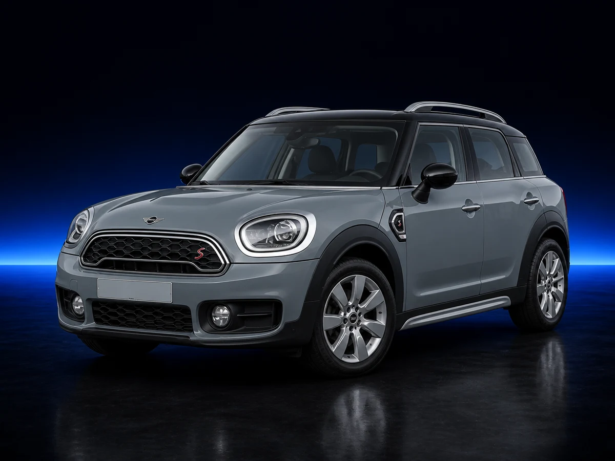 Grey Mini Countryman F60 on a deep navy and cobalt studio background.