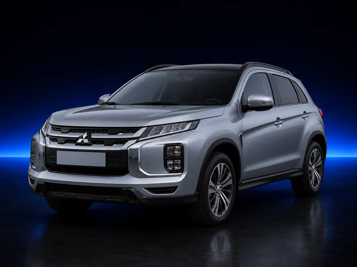 Silver Mitsubishi ASX first-generation second facelift on a deep navy and cobalt studio background.