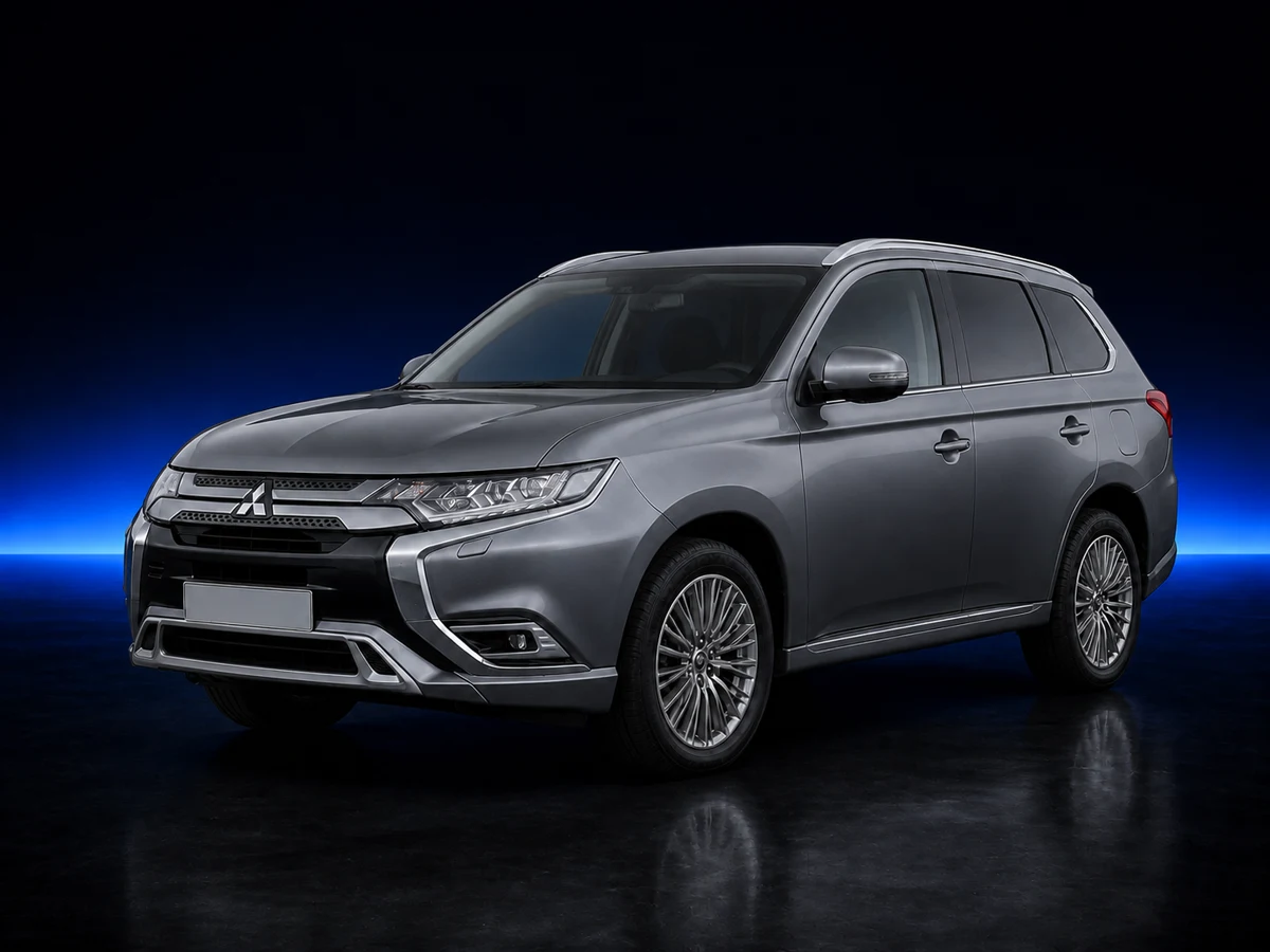 Grey Mitsubishi Outlander III facelift PHEV on a deep navy and cobalt studio background.