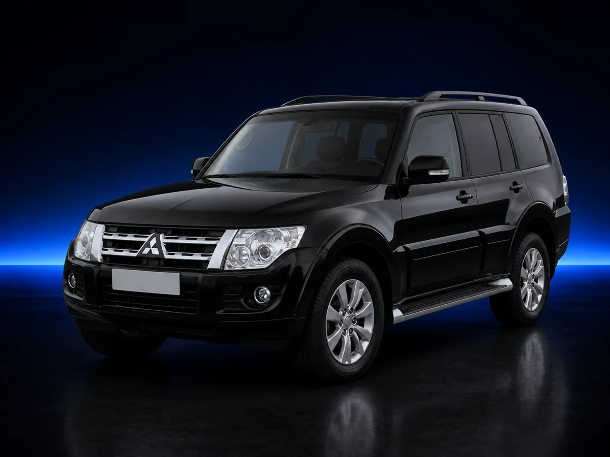 Black Mitsubishi Shogun IV SG3 LWB on a deep navy and cobalt studio background.