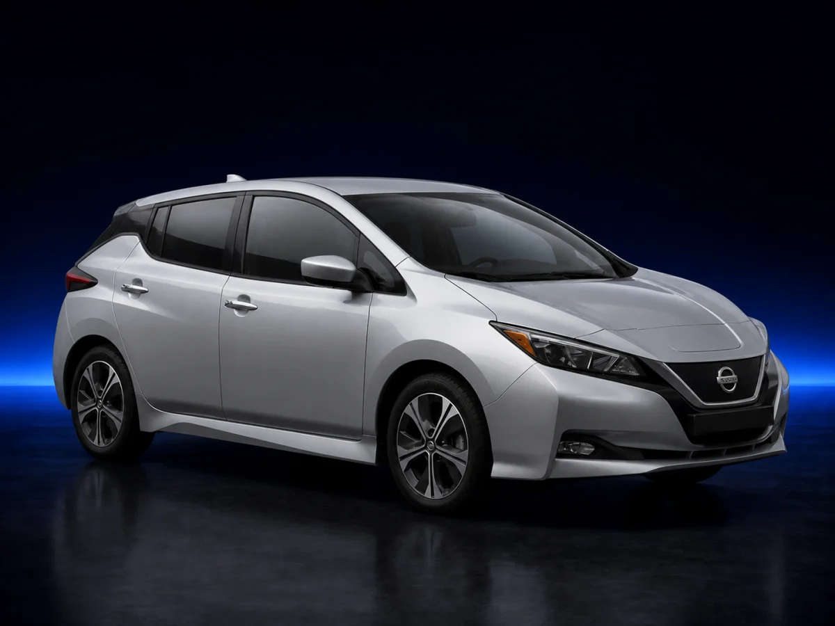 Silver Nissan Leaf ZE1 SV viewed from the front three-quarter angle.