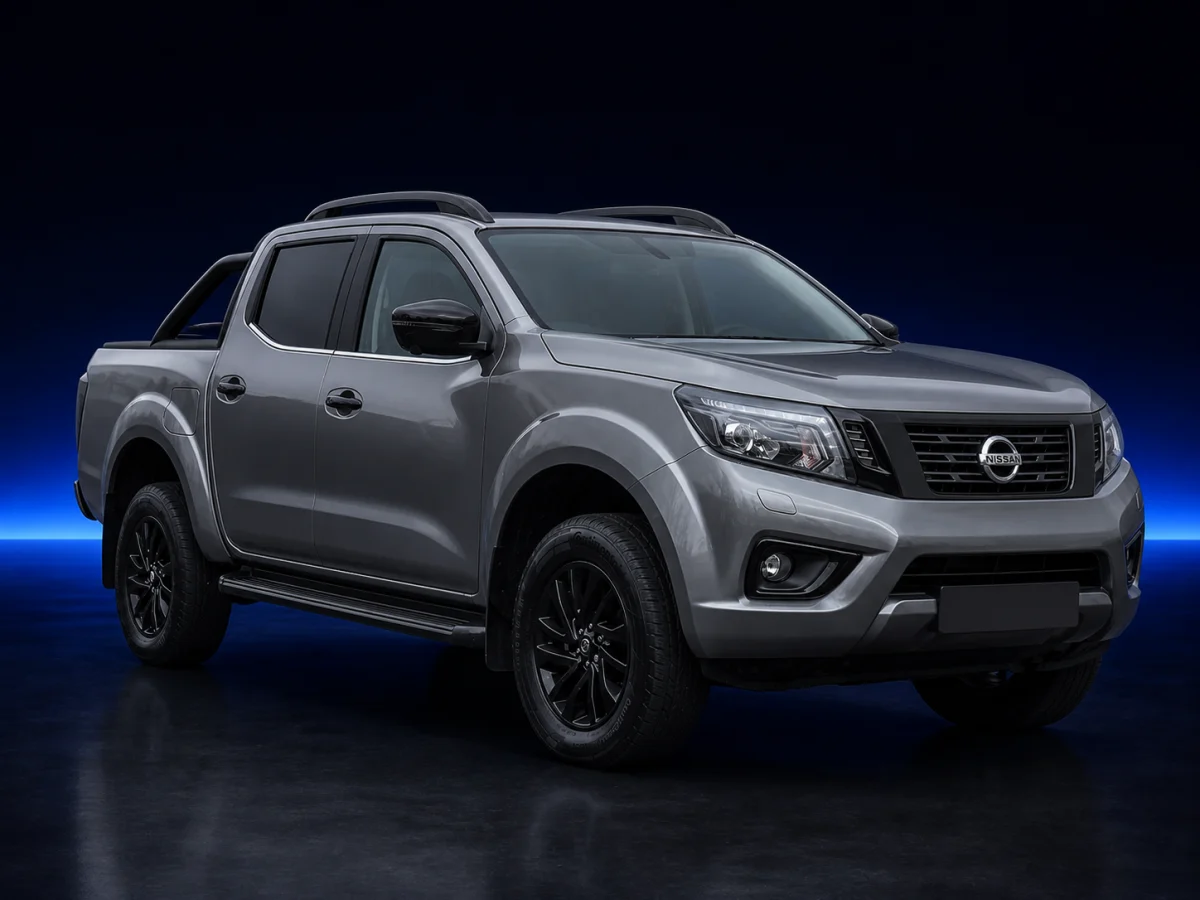 Grey Nissan Navara D23 N-Guard viewed from the front three-quarter angle.