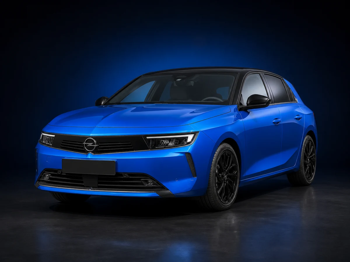 Blue Opel Astra L hatchback on a deep navy and cobalt studio background.