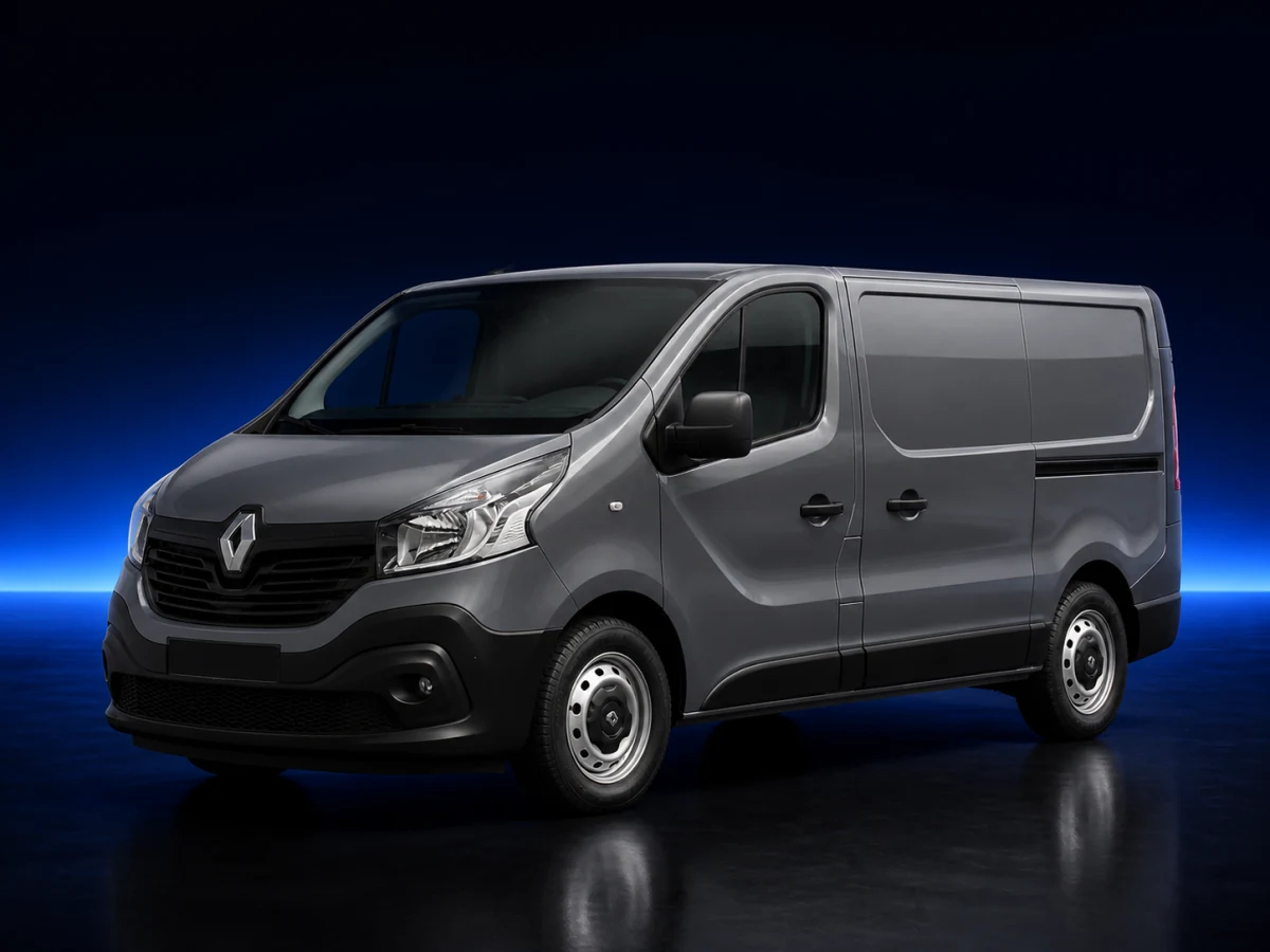 Grey Renault Trafic X82 panel van on a deep navy and cobalt studio background.