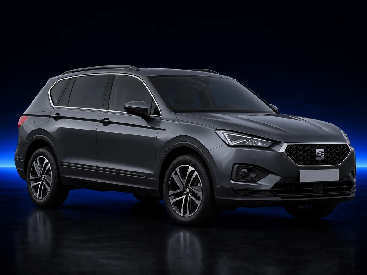 Grey SEAT Tarraco on a deep navy and cobalt studio background.