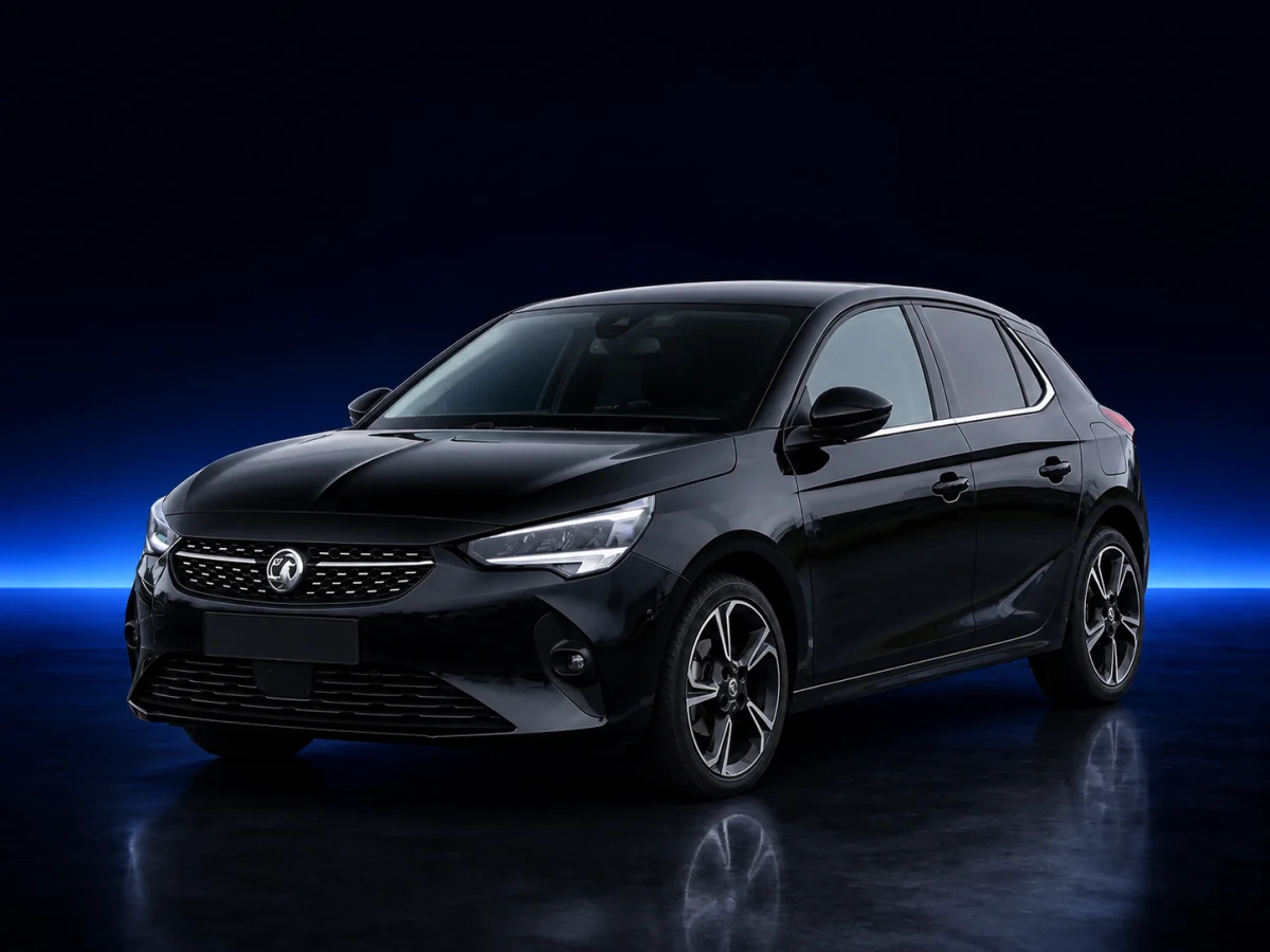 Black Vauxhall Corsa F on a deep navy and cobalt studio background.