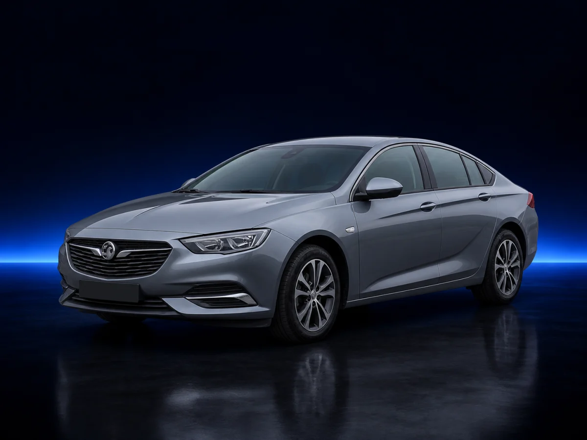 Grey Vauxhall Insignia B Grand Sport on a deep navy and cobalt studio background.