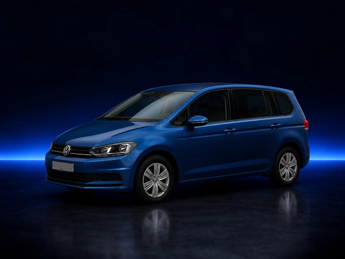 Blue Volkswagen Touran II on a deep navy and cobalt studio background.