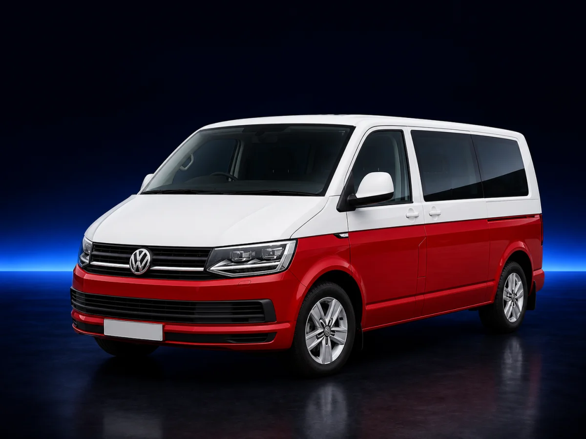 Red and white Volkswagen Transporter T6 on a deep navy and cobalt studio background.