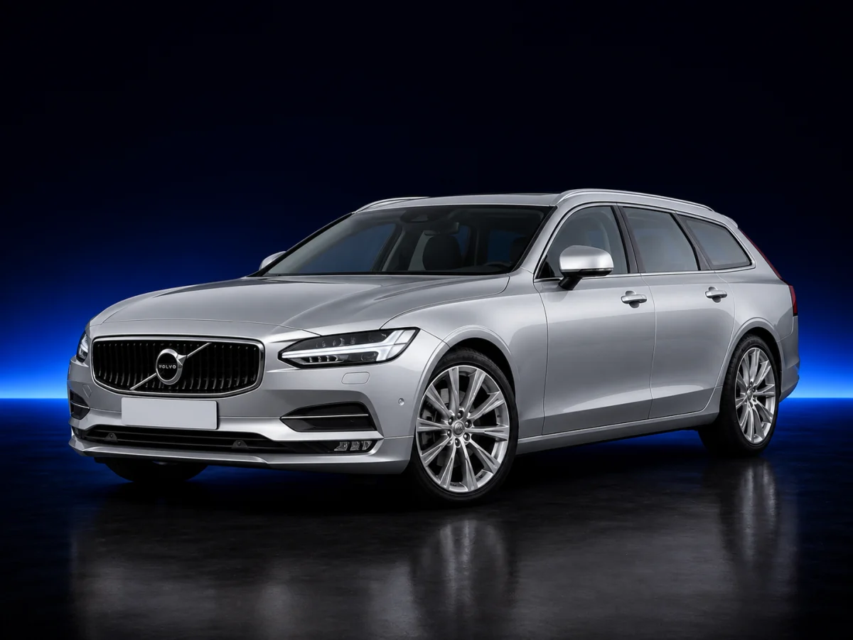 Silver Volvo V90 SPA estate on a deep navy and cobalt studio background.
