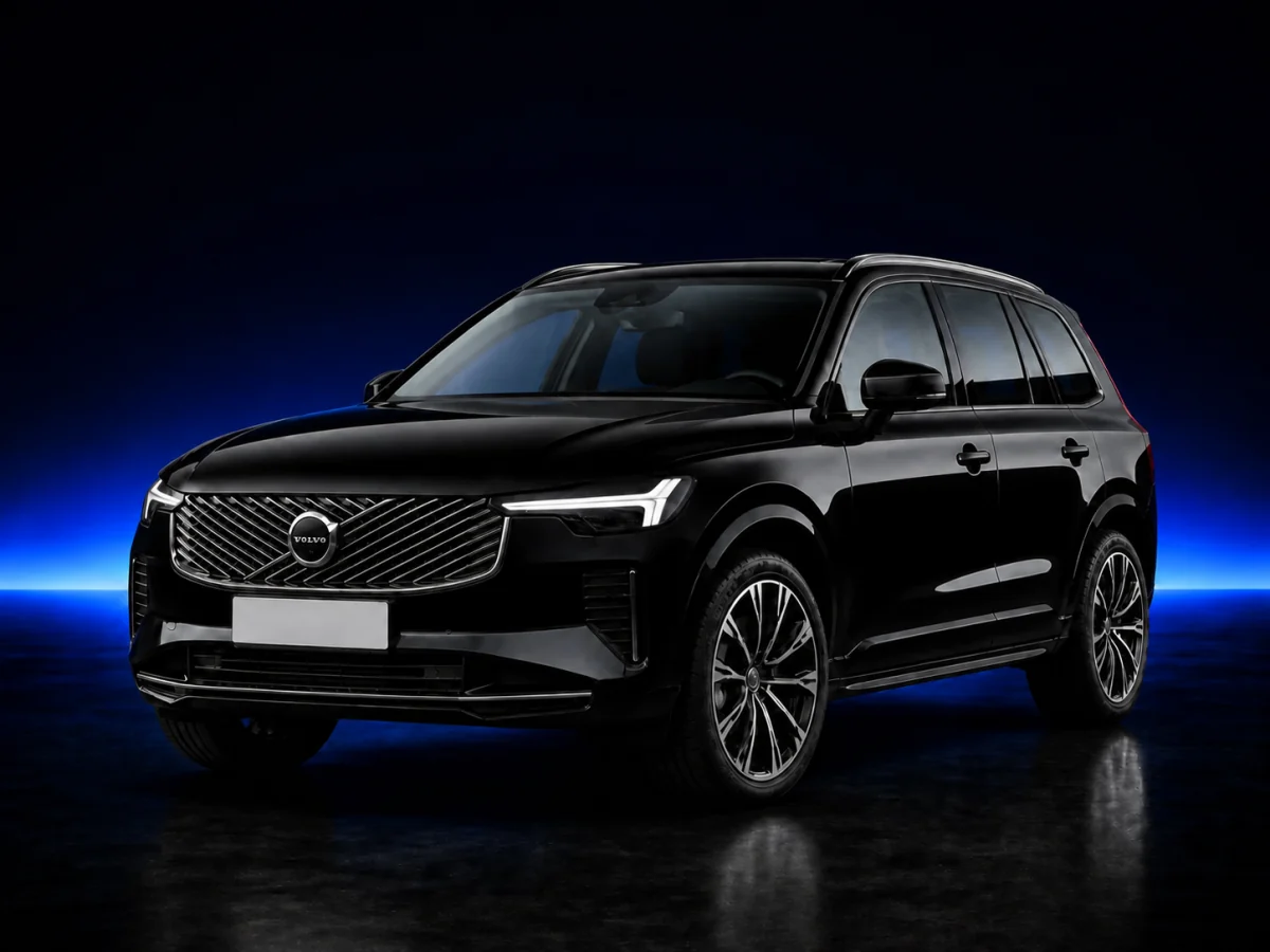 Black Volvo XC90 SPA on a deep navy and cobalt studio background.